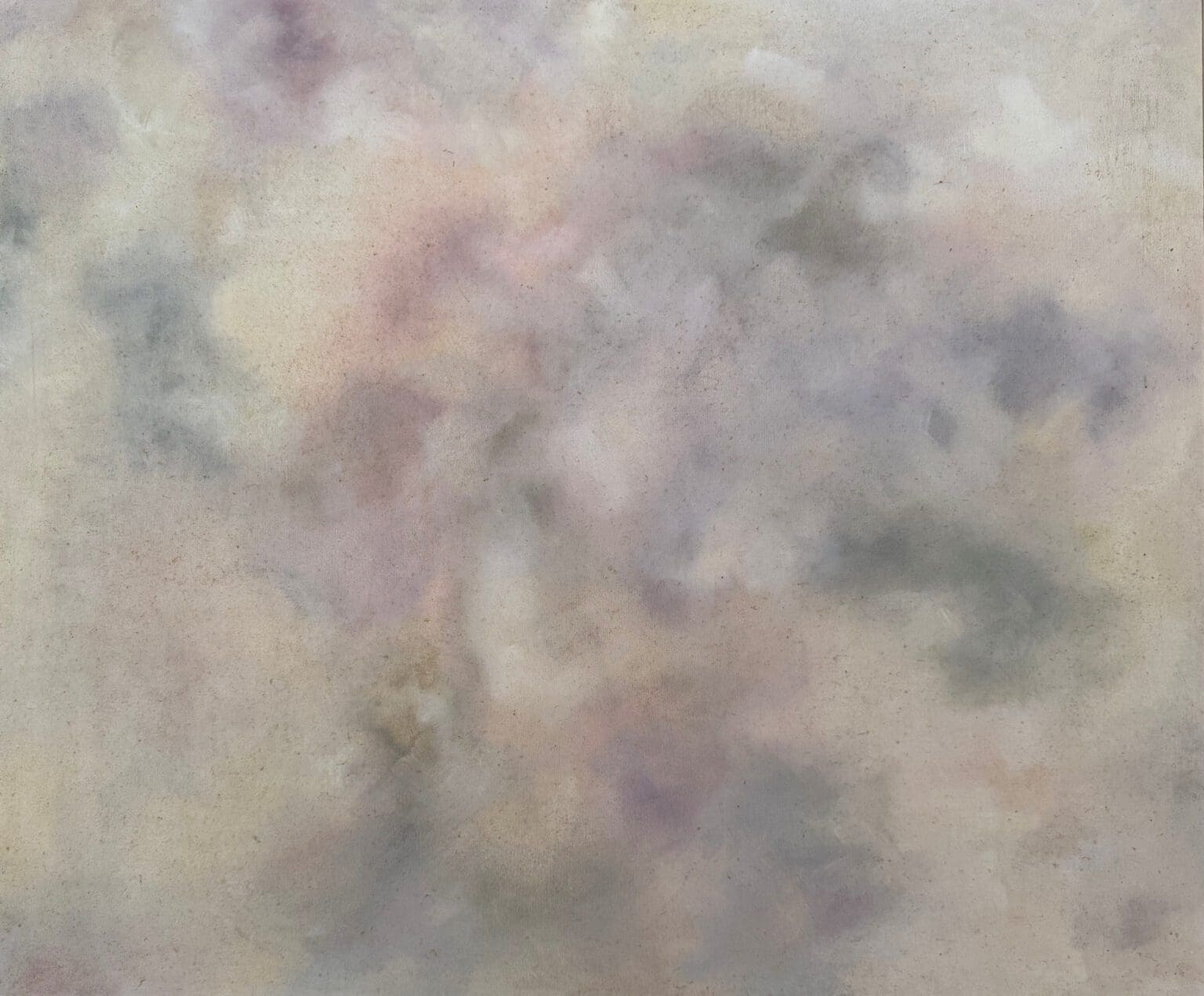 Abstract blend of soft pastel colors with cloud-like texture.