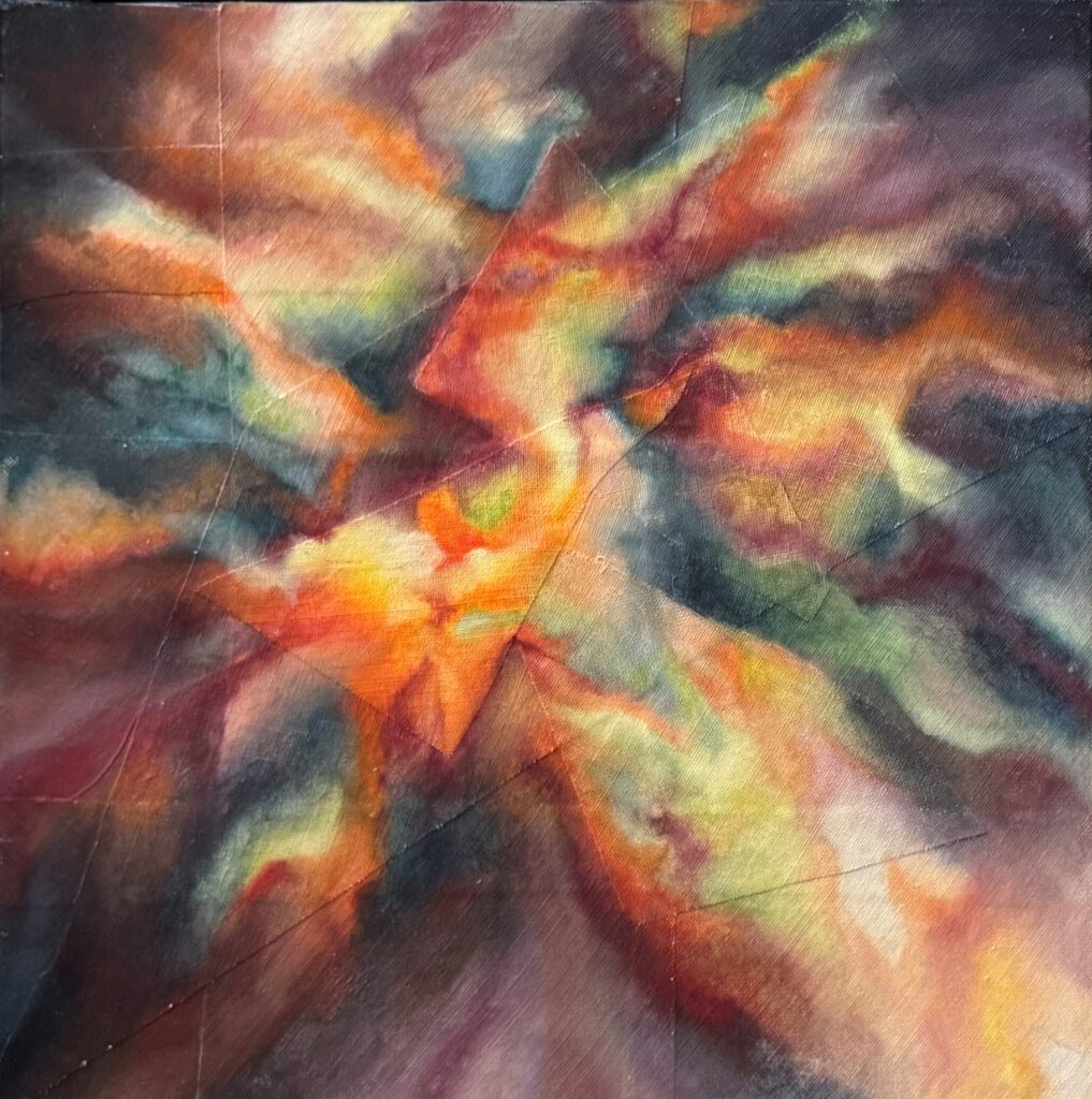 Abstract colorful cloud-like formation with dynamic swirls.